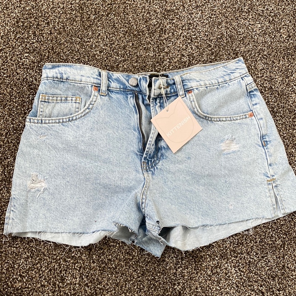 Brand new, kittenish jean shorts, size 28